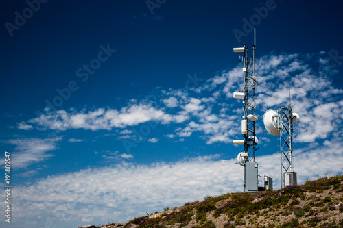 Mountain top weather station with a blue sky