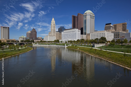 Columbus  Ohio was built along the Scioto River in the downtown district.  The Scioto Mile includes a path for recreation in this urban riverfront setting.