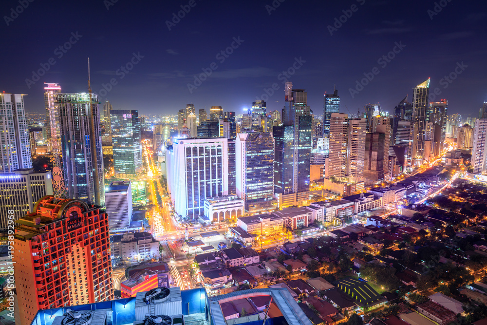 Obraz premium Eleveted, night view of Makati, the business district of Metro Manila