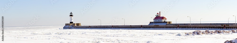 Lighthouses on frozen Lake Superior waterfront, Duluth, Minnesota in winter