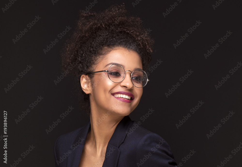 Afro woman with toothy beautiful smile. Afro woman with toothy beautiful smile.