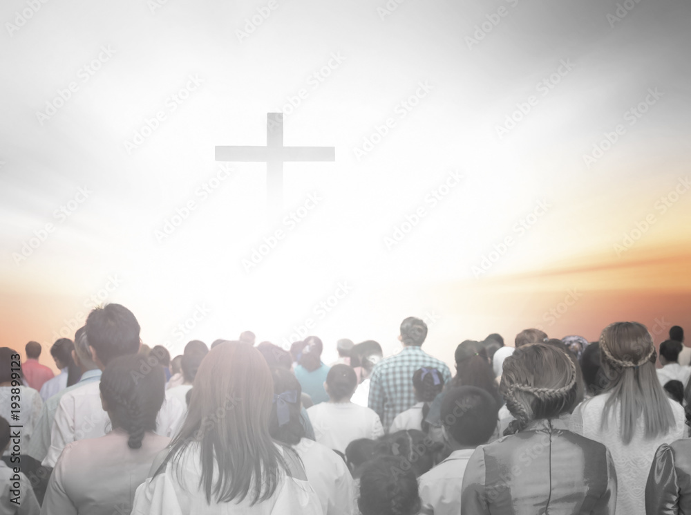 soft focus of christian people group raise hands up worship God Jesus