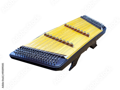 Thai traditional music instrument called zither  isolated on white background including clipping path. photo