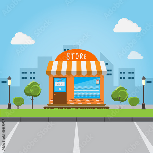 store front building with big city background.