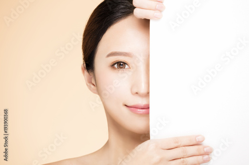 half  beauty face with blank board concept