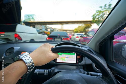 A man driving car on the road