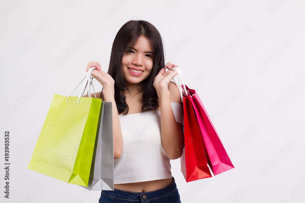 happy smiling girl shopping, excited woman holding shopping bag isolated, smiling girl happy woman shopping colorful bag, asian lady happy shopping concept cute pretty girl beautiful woman asian model