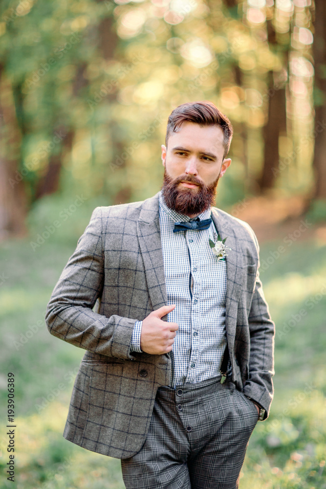 Handsome bearded hipster groom. Handsome bearded hipster groom.