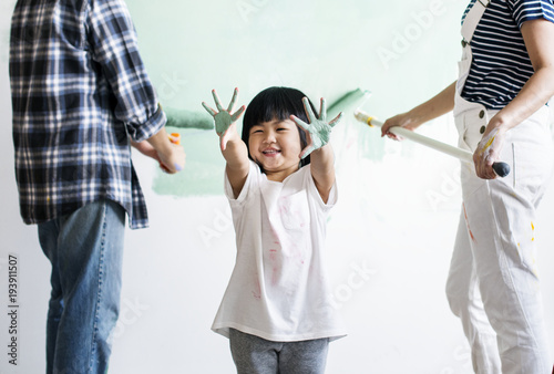 Asian family renovating the house