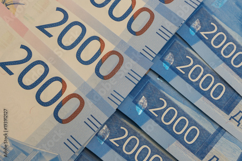 close up view of cash money dollars bills in amount . photo