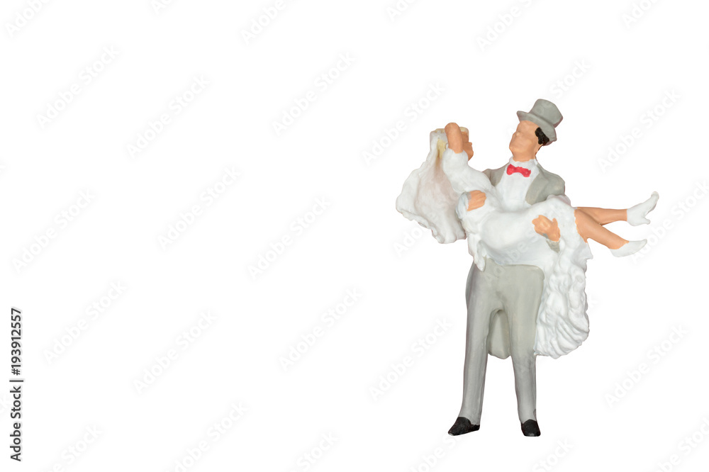 Miniature people : Wedding bride and groom isolated on white Miniature people : Wedding bride and groom isolated on white