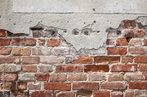 Old crumbling brick wall