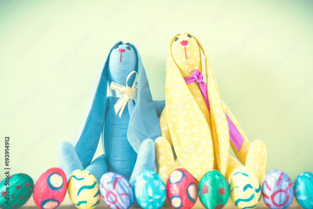 Easter bunnies on a green background