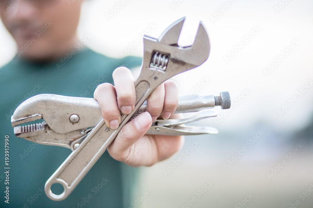 Worker or Enginerring in a green uniform prepare hard work. Worker or Enginerring in a green uniform prepare hard work.