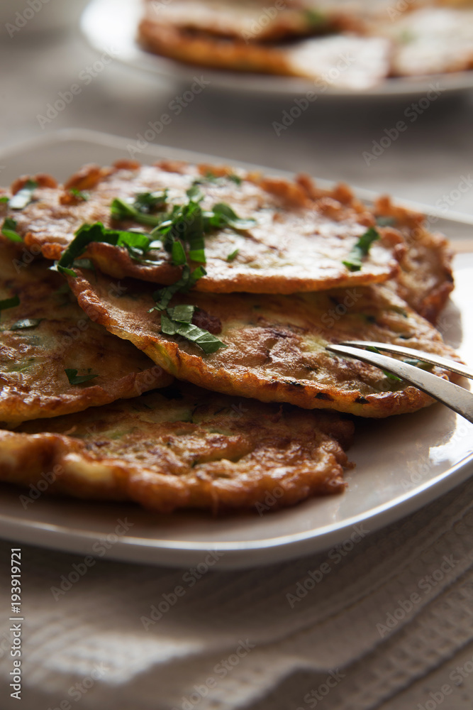Vegetable pancakes on a white plate
