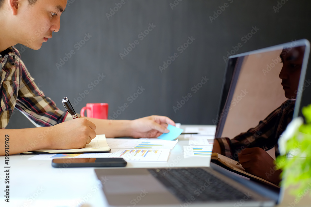 Young workers working with new startup project in modern loft office. Business people working with new startup project in modern office. Young workers working with new startup project in modern loft office. Business people working with new startup project in modern office.