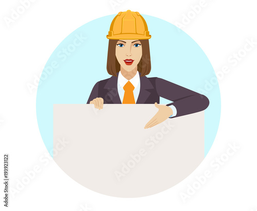 Businesswoman holding white blank poster and showing blank signboard