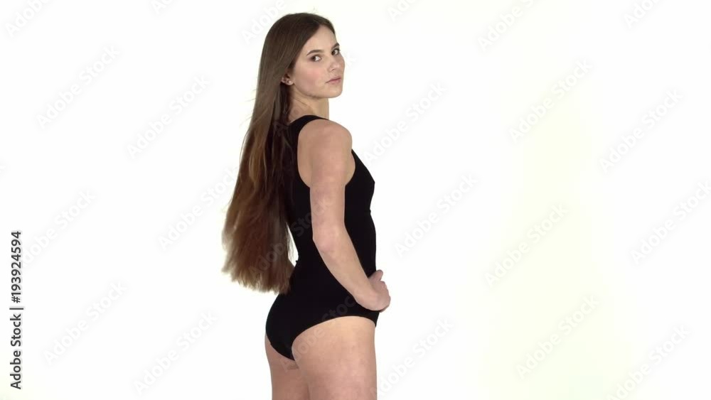 Beautiful and sexy young woman in a black body with dark hair. Beautiful and sexy young woman in a black body with dark hair.