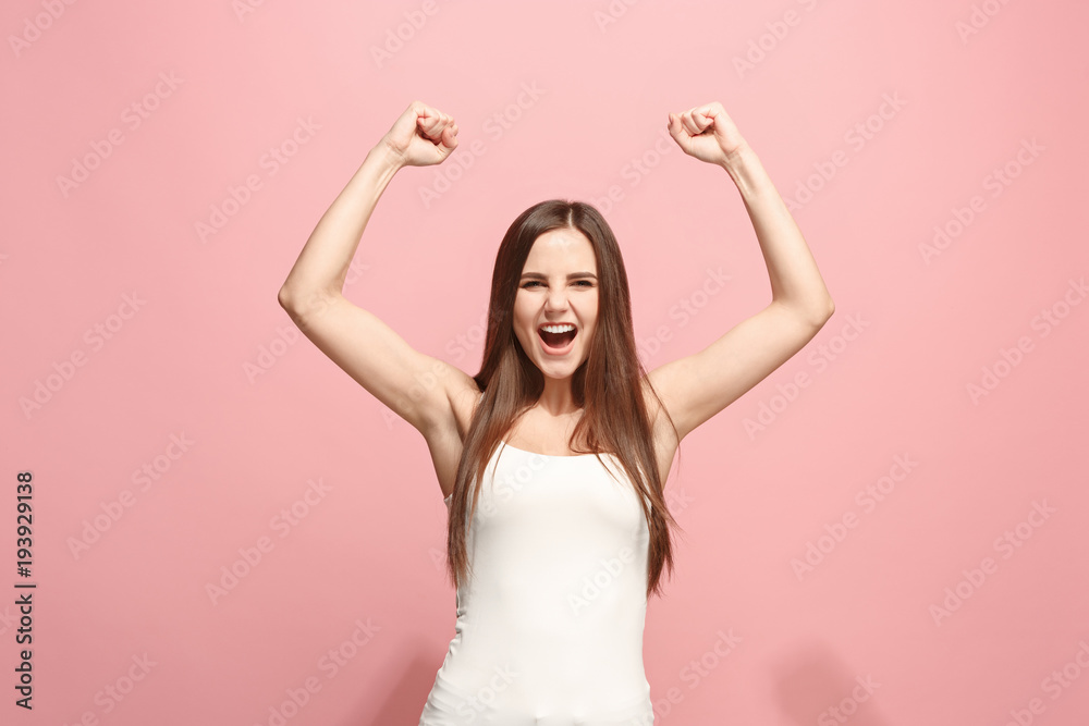 Winning success woman happy ecstatic celebrating being a winner. Dynamic energetic image of female model Winning success woman happy ecstatic celebrating being a winner. Dynamic energetic image of female model