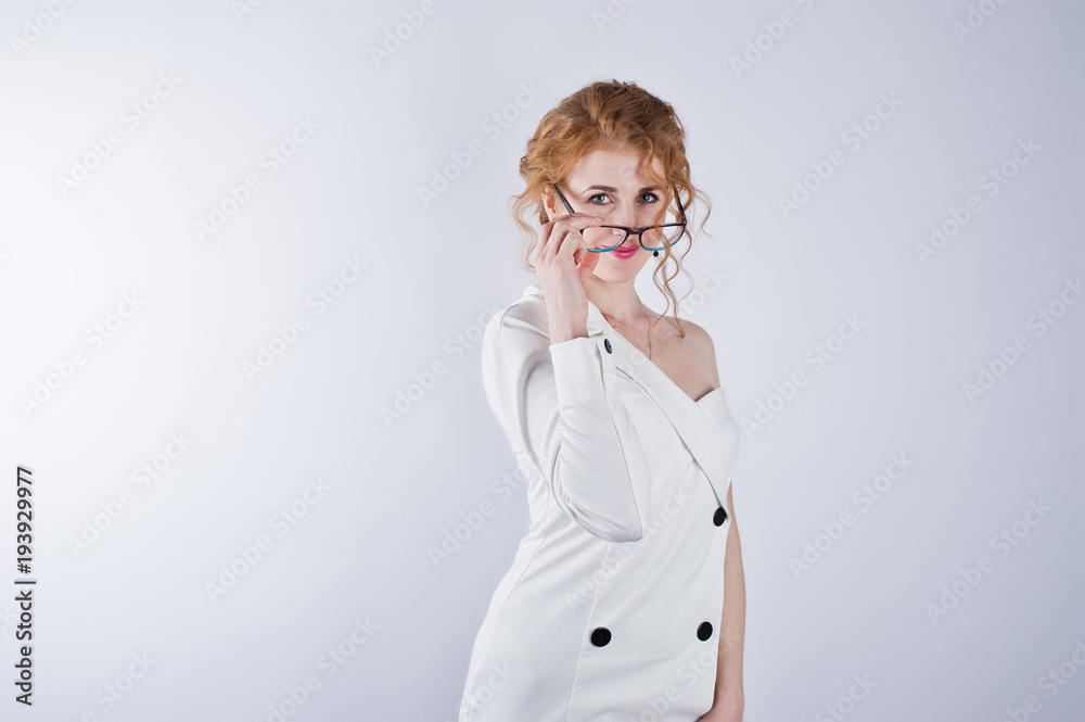Curly hair girl in glasses isolated on white studio background. Curly hair girl in glasses isolated on white studio background.