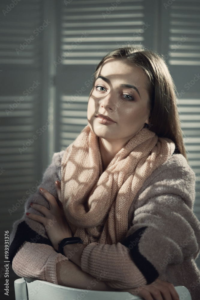 close-up portrait of beautiful girl in studio on black background.