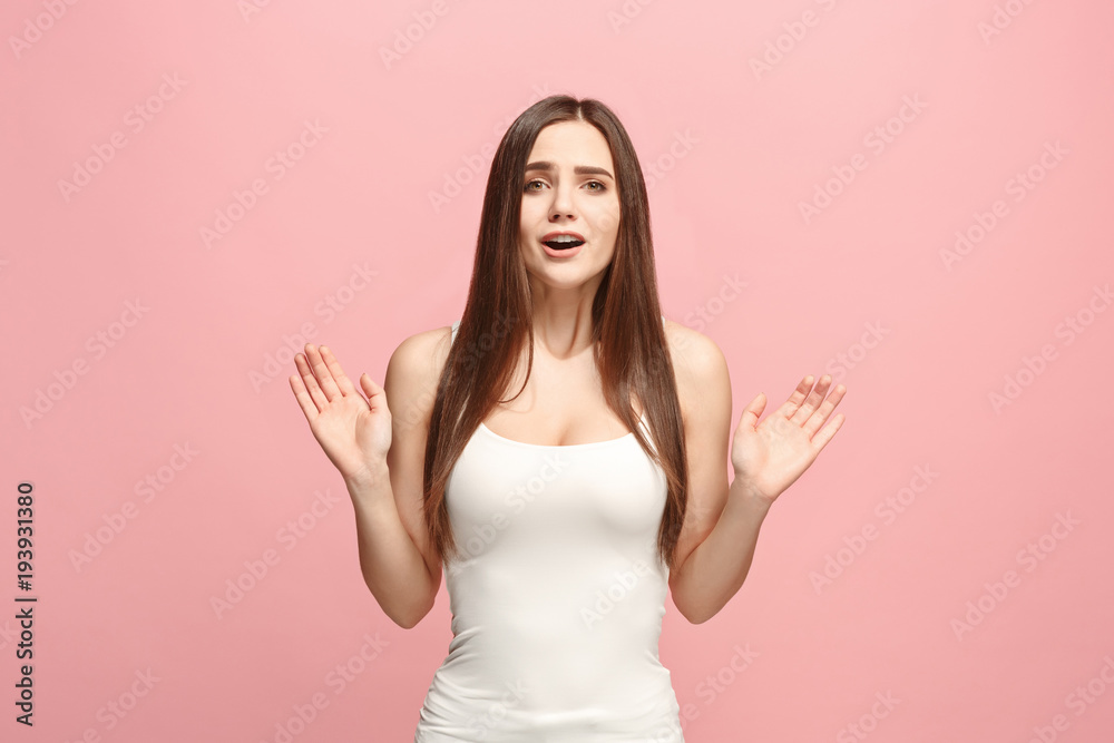 Beautiful woman looking suprised isolated on pink Beautiful woman looking suprised isolated on pink
