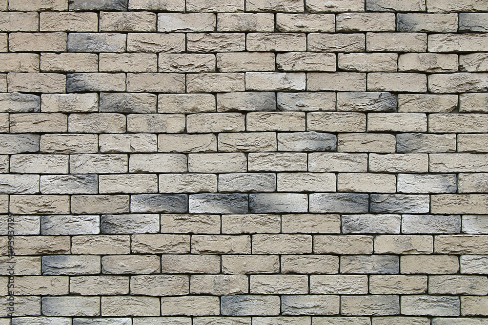Fototapeta premium Texture from a fragment of a gray brick wall