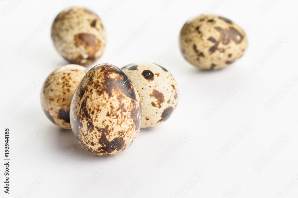 Quail eggs on white background. Organic product. Quail eggs on white background. Organic product.