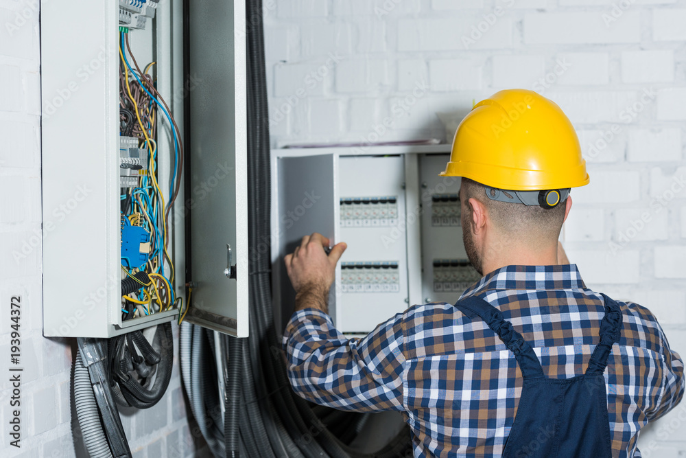 Male electrician repairing circuit line Male electrician repairing circuit line