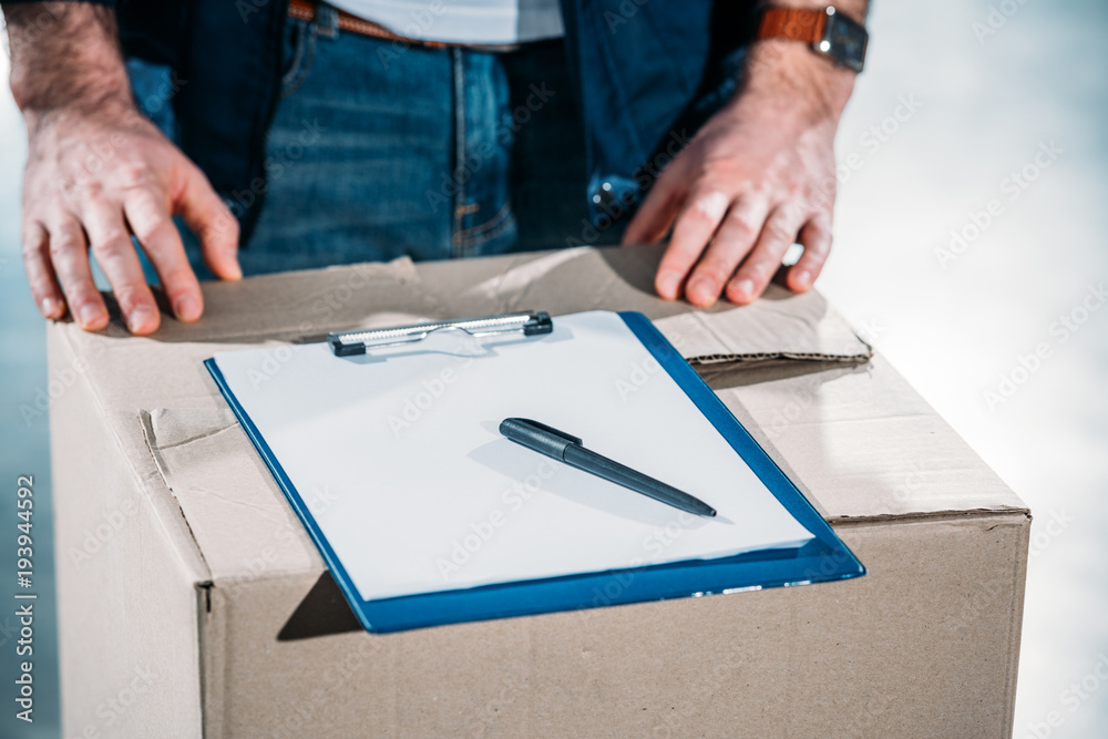 Courier by empty cargo declaration on cardboard package Courier by empty cargo declaration on cardboard package