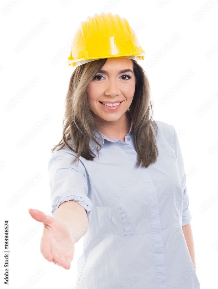 Portrait of female constructor offering hand shake. Portrait of female constructor offering hand shake.