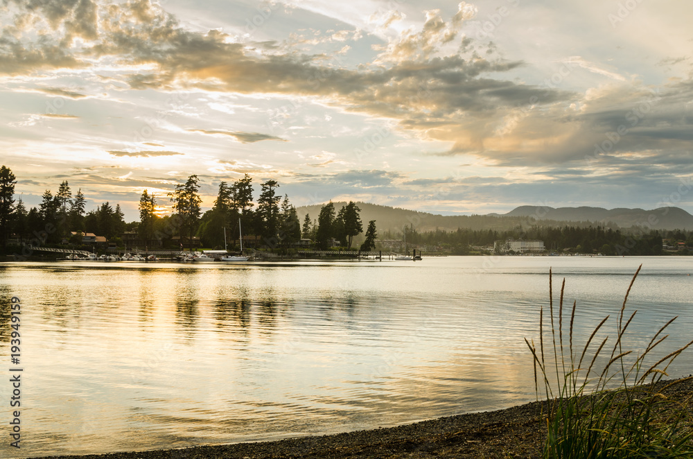 Summer Sunset over a Beautiful Bay with Forested Coastline. Sooke, BC, Canada.