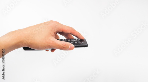Remote tv in hand holding, switching channels