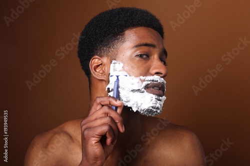 Beautiful man shaving