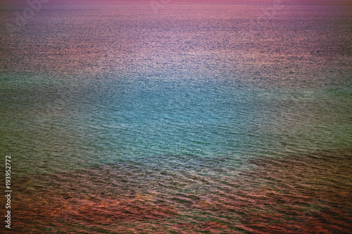 Background of ocean and texture sea water on sunset different color