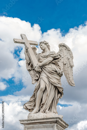 Holy angel with a cross at Bridge Saint Angelo  Rome  Italy
