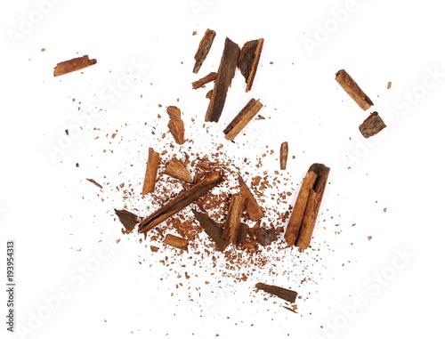 Cinnamon shavings isolated on white background, top view