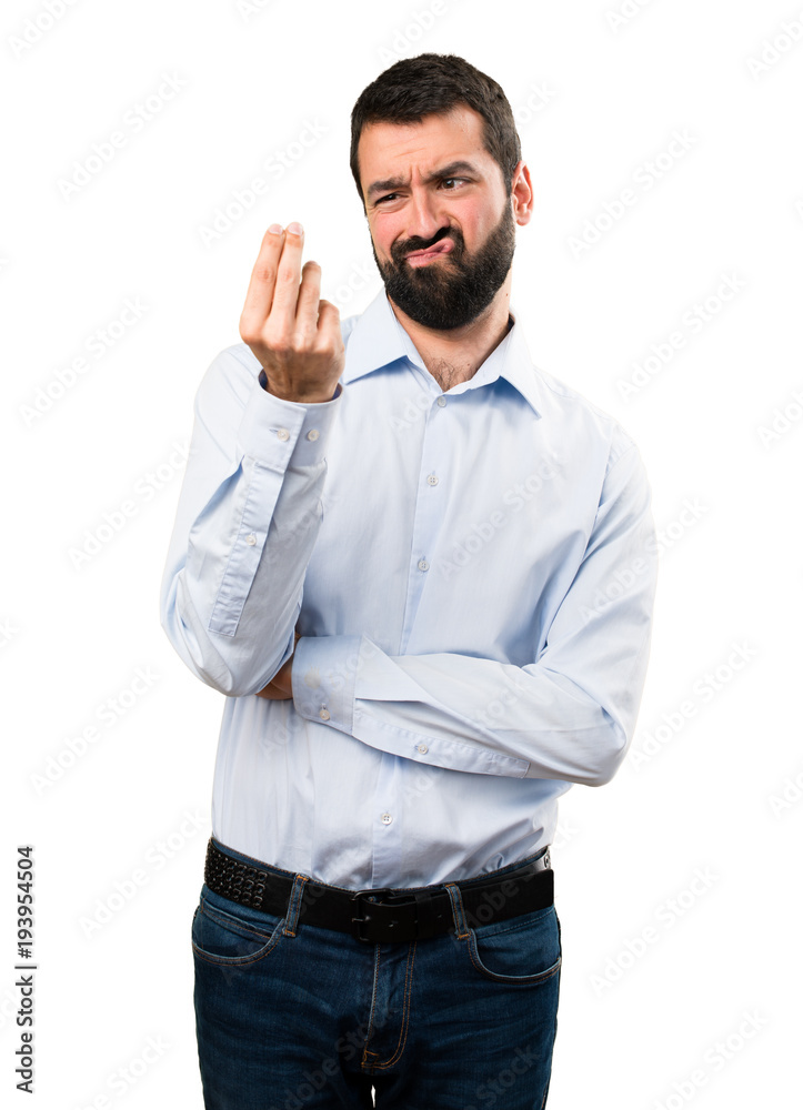 Naklejka premium Handsome man with beard making money gesture