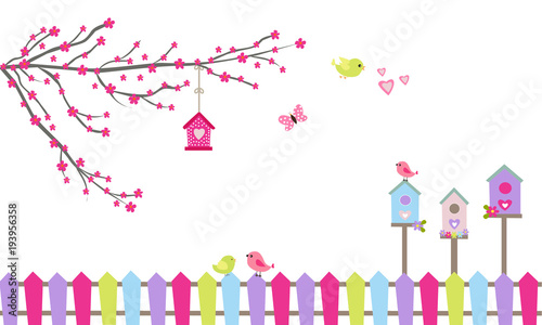 Ramas de árbol con flores rosas nidos y valla de colores.1
