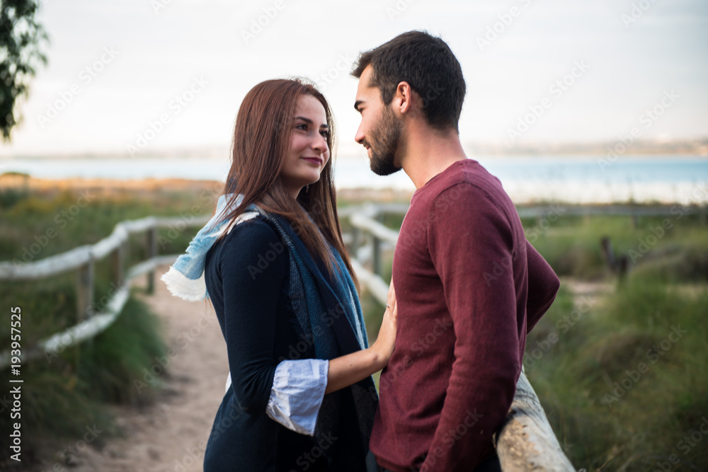 Young couple in love, man and girl in outdoor Young couple in love, man and girl in outdoor