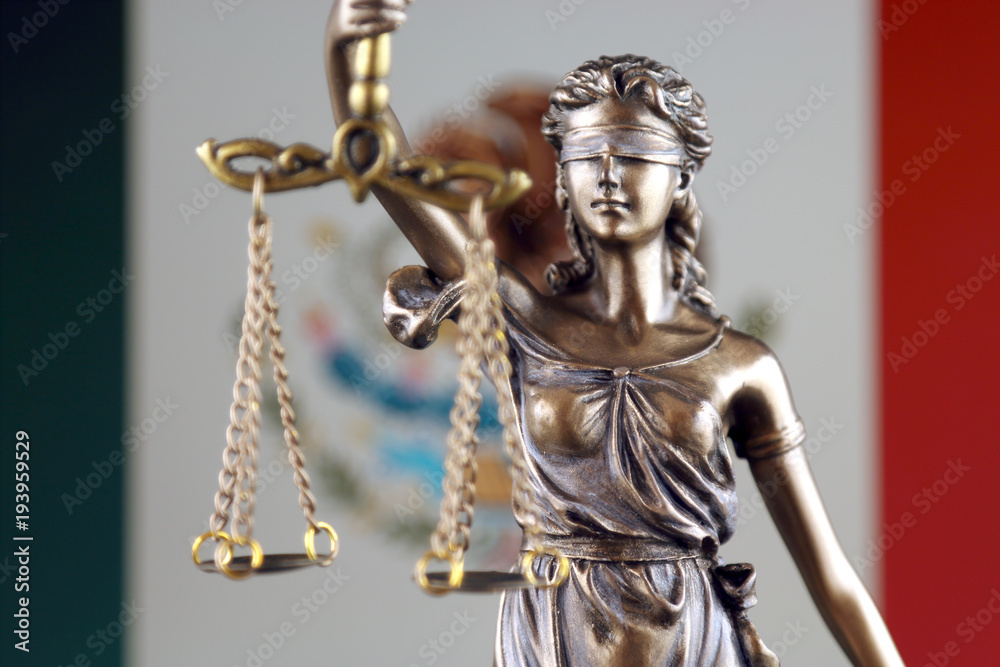 Photography Symbol of law and justice with Mexico Flag. Close up.