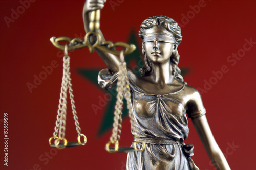 Symbol of law and justice with Morocco Flag. Close up.