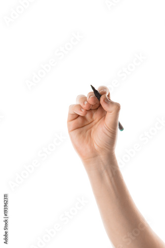 Male hand writing with the marker or felt pen. Isolated on white background. © Vlajko611