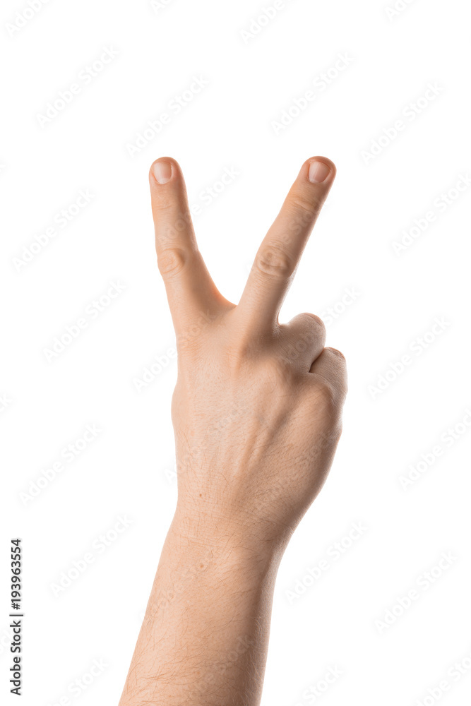 Male hand with victory gesture, hand gesture. Isolated on white background. Male hand with victory gesture, hand gesture. Isolated on white background.