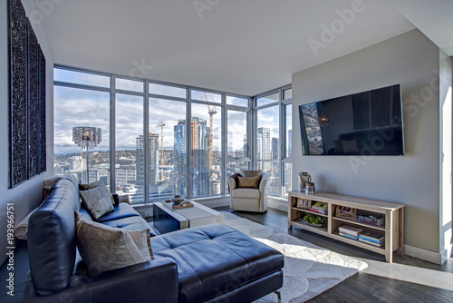 Light filled family room with panoramic view of Seattle photo