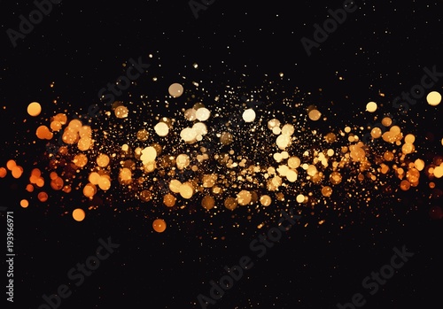 Gold bokeh isolated on black background