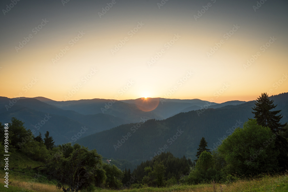 Panoramic view of colorful sunrise in mountains