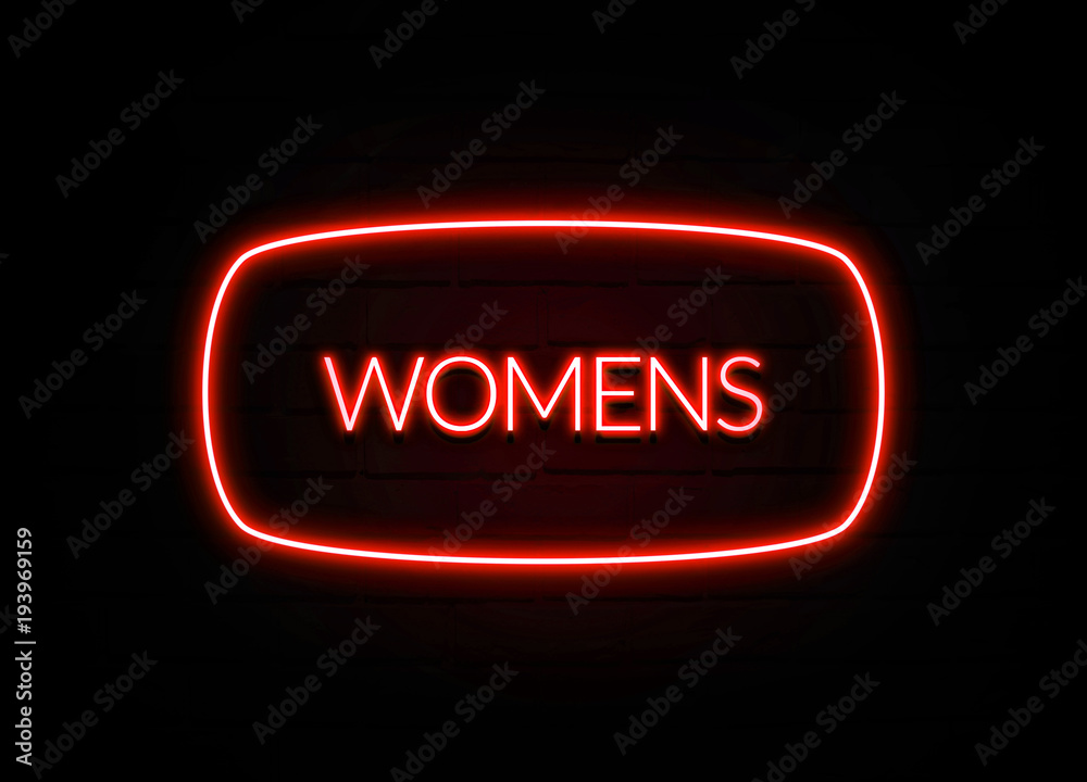 Womens neon sign on brick wall background. Womens neon sign on brick wall background.