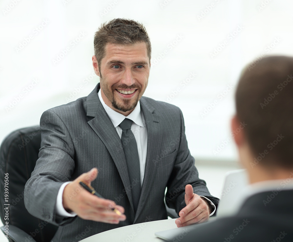 closeup.Manager and client discussing the terms of the contract in the office. closeup.Manager and client discussing the terms of the contract in the office.
