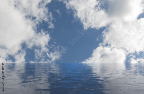 Calm sea with ripples leading to a blue sky with white clouds